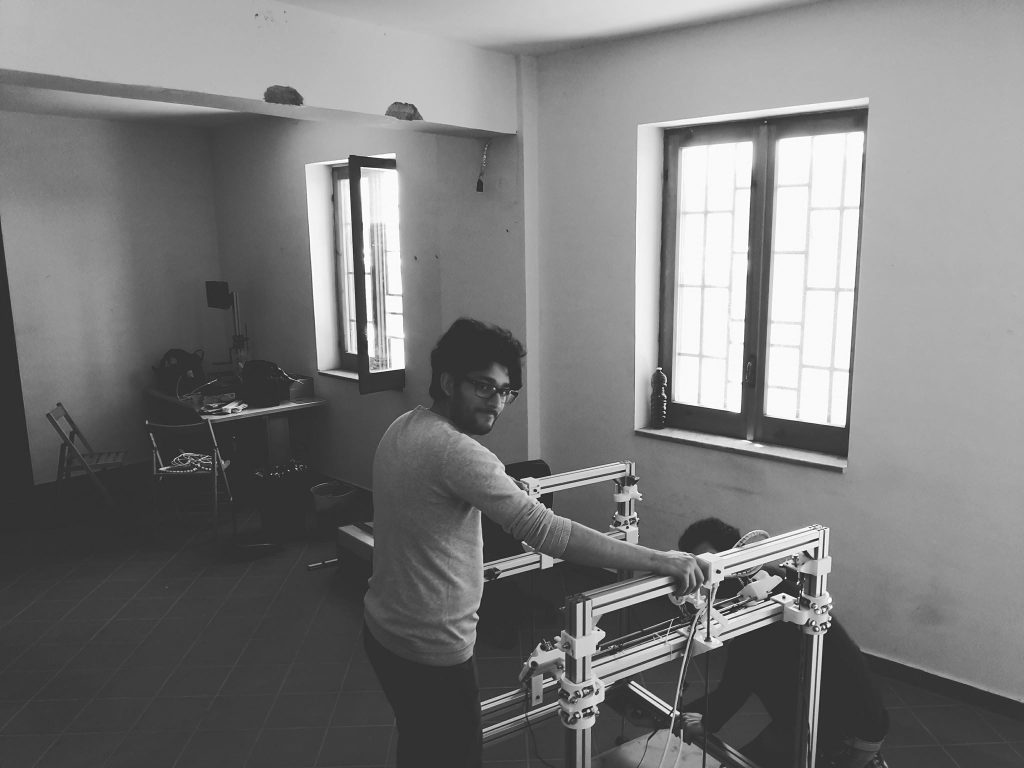 Davide Cervone and Beniamino Izzo in the CoreXY laboratory